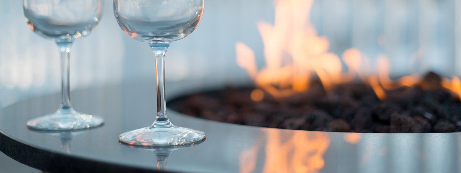 Outdoor fire table Coastal Suites Resort Michigan