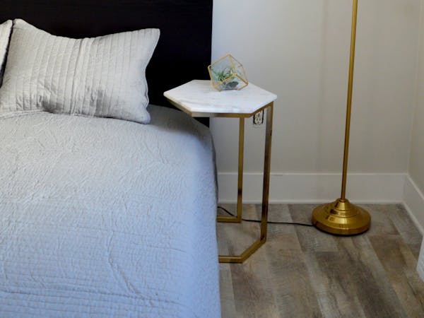 Luxurious queen bed in 1 bedroom northern Michigan suite