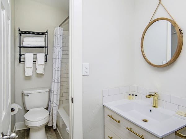 Luxury hotel bathroom Coastal Suites Resort