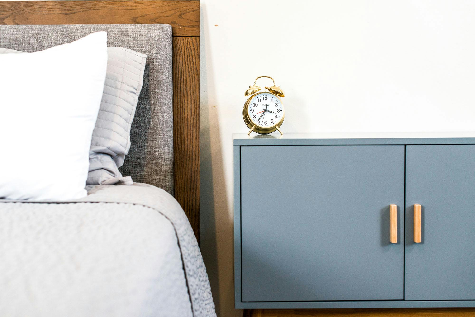 Luxury hotel room bed and nightstand Beulah Michigan