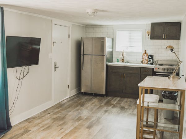 Kitchenette and dining area in luxury hotel suite
