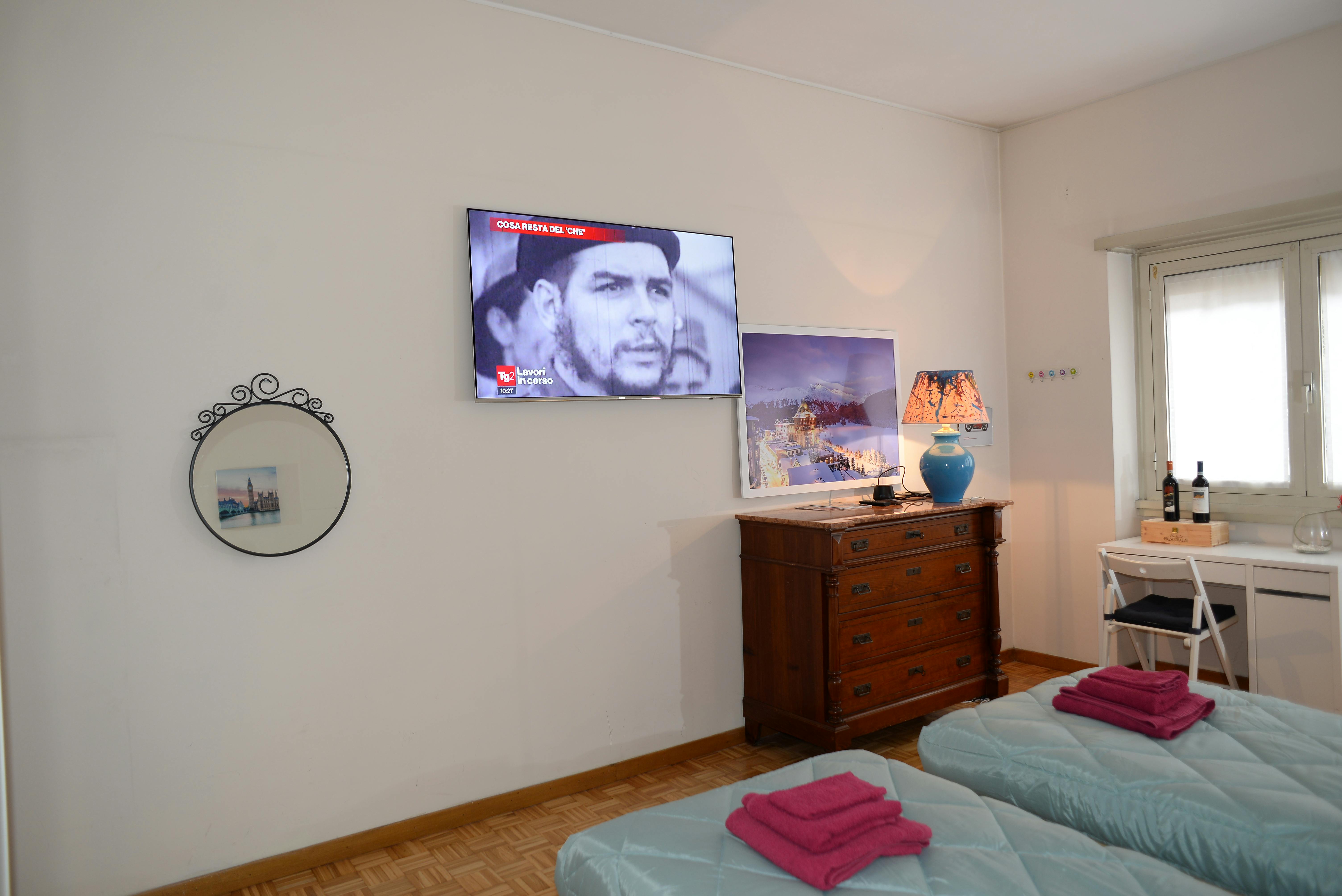 Deluxe White Room with Samsung Television 55 inches