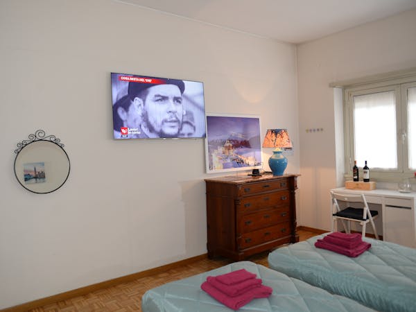 Deluxe White Room with Samsung Television 55 inches