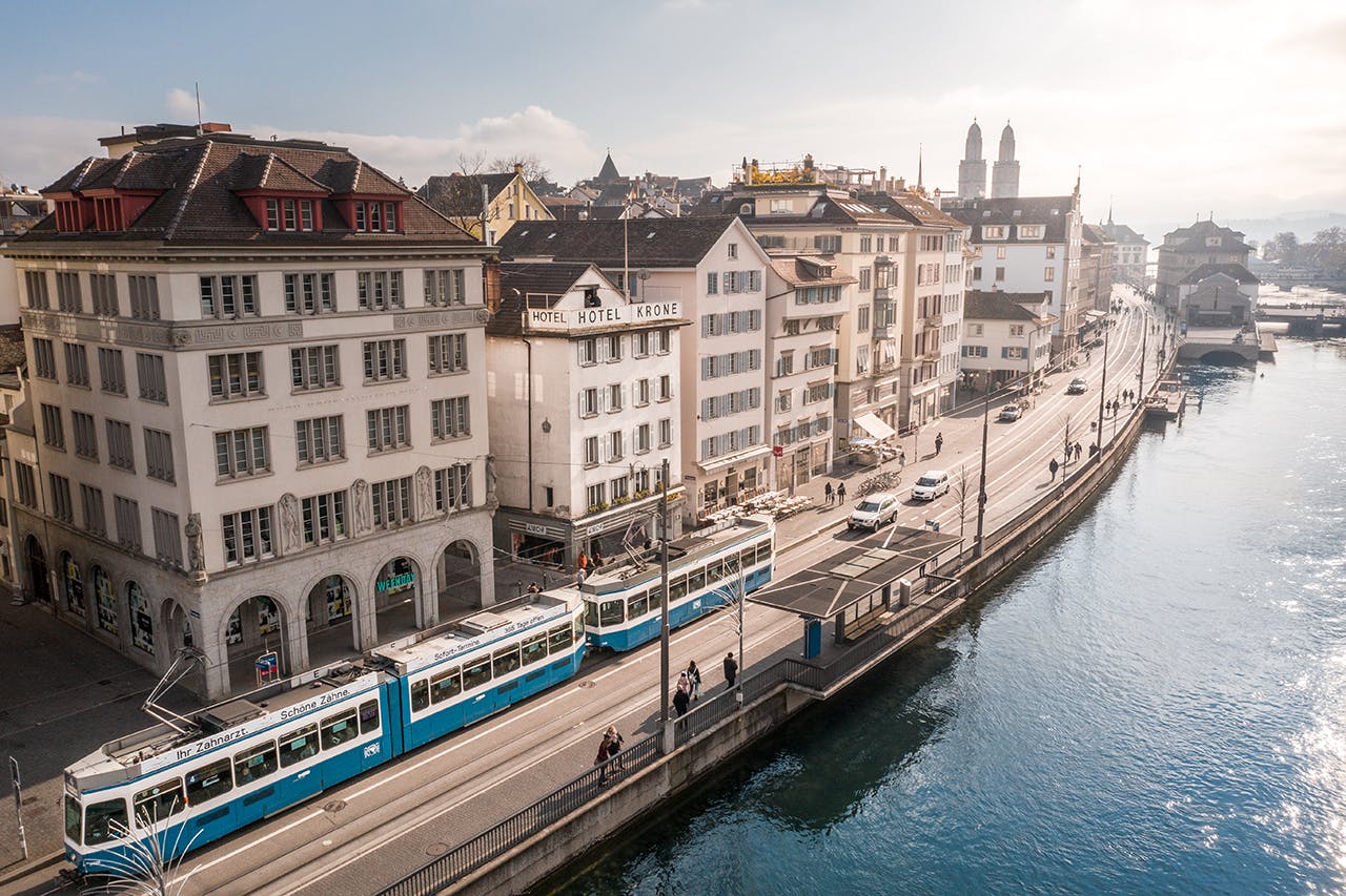 KRONE Zürich Pop Up Hotel Outside view left with tram