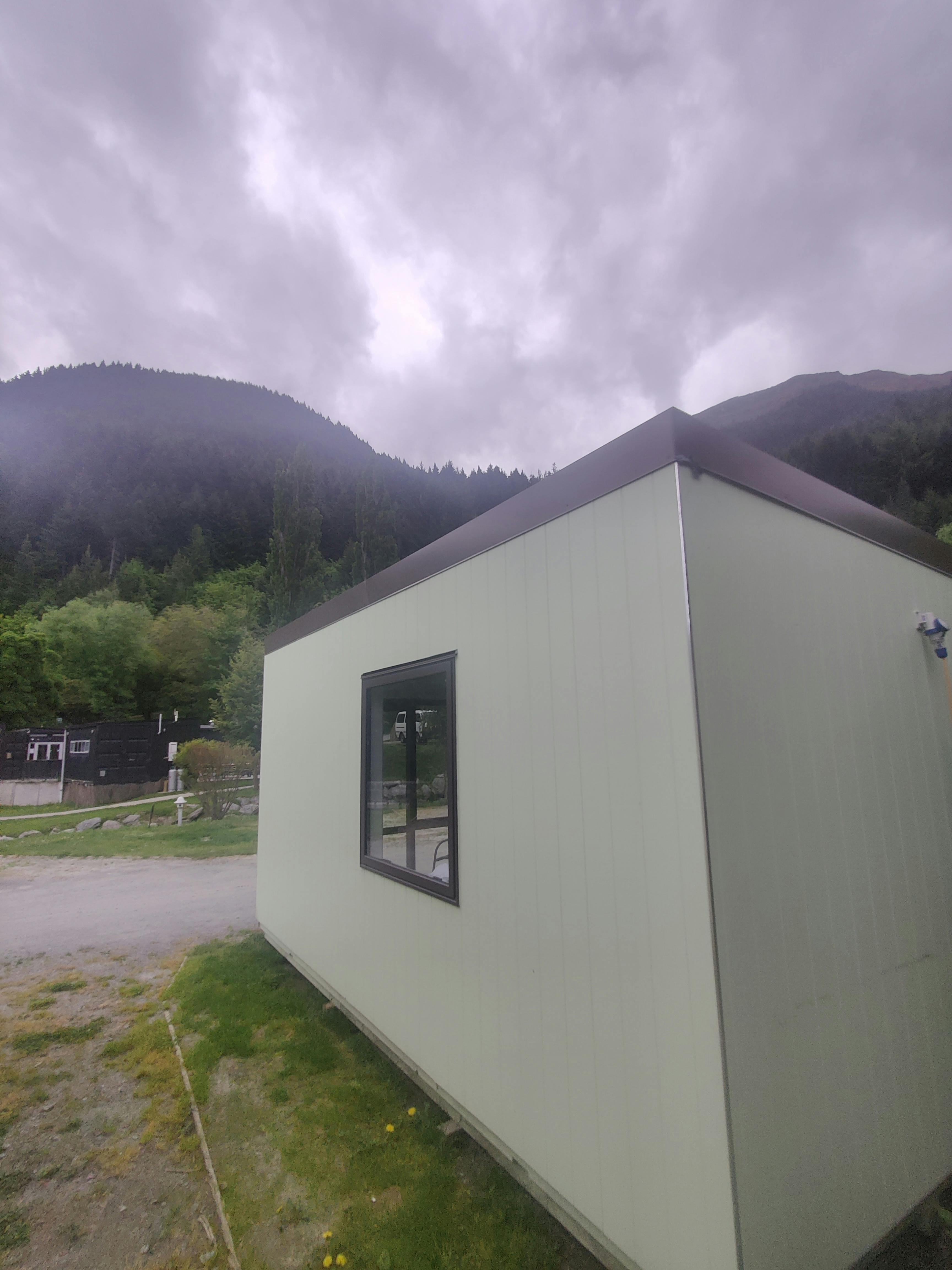 In between two mountains at QBox Campground Queenstown