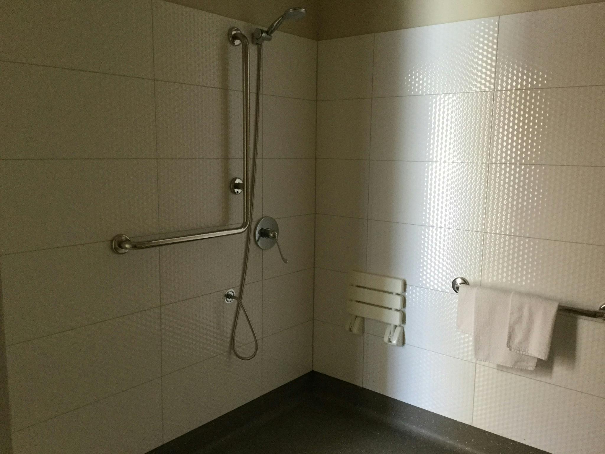 The bathroom meets all accessibility requirements.