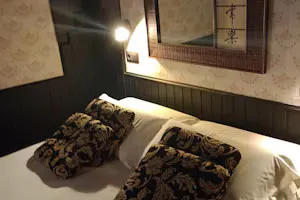 Detalle cama y cabecero Kioto