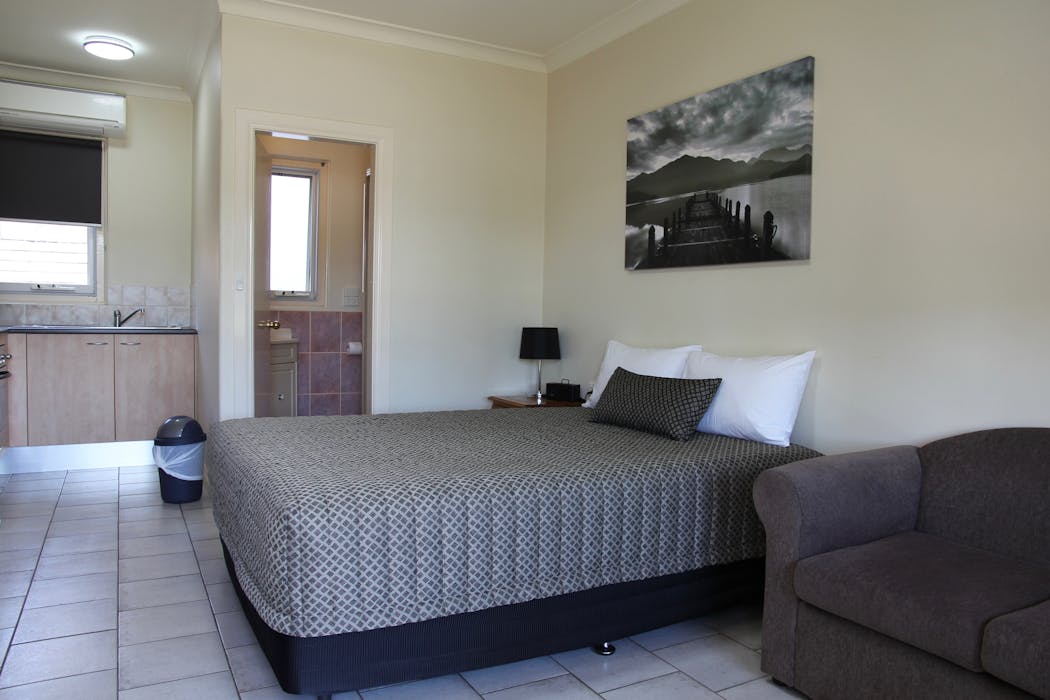 Comfortable queen-size bed in Tumut room