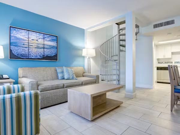 Grand Seas Resort - Daytona Beach, FL, beach resort w/ spacious accommodations, living area, & oceanfront views.