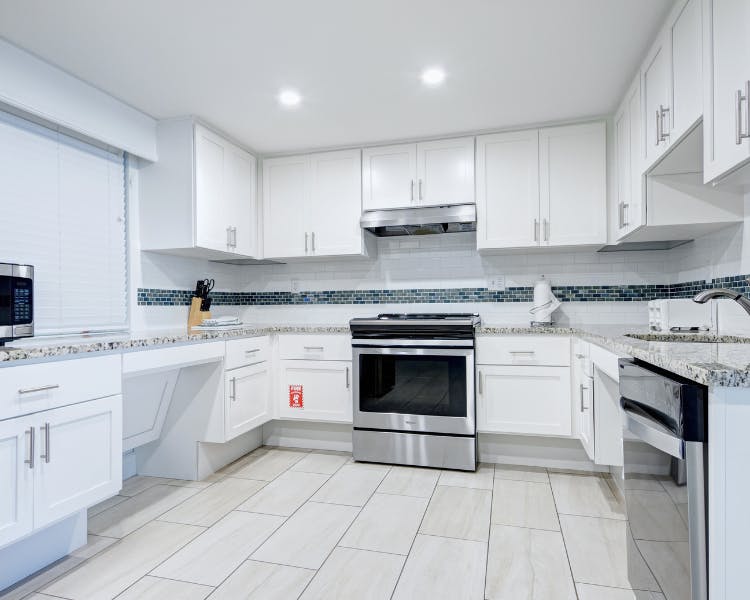 Grand Seas Resort - Daytona Beach, FL, beach resort w/ spacious accommodations, living area, kitchen, & oceanfront views.