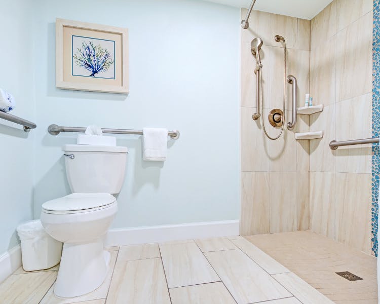 Grand Seas Resort - Daytona Beach, FL, beach resort w/ spacious accommodations, living area, kitchen, & oceanfront views.