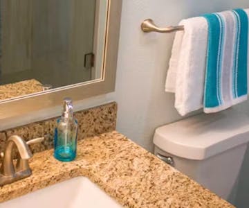 Grand Seas Resort - Daytona Beach, FL, beach resort w/ spacious accommodations, living area, kitchen, & oceanfront views.