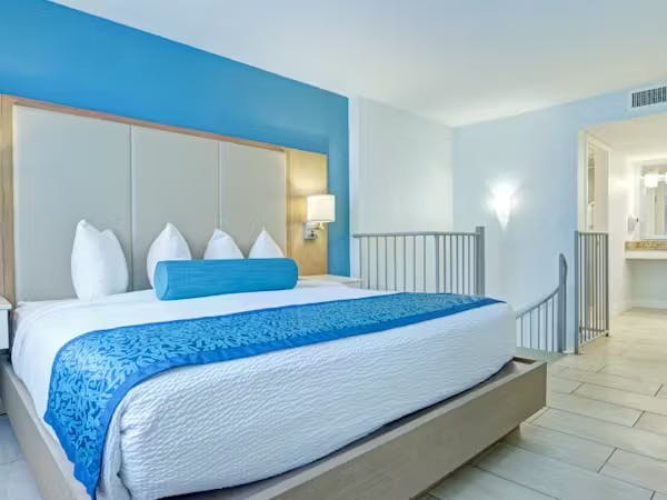 Grand Seas Resort - Daytona Beach, FL, beach resort w/ spacious accommodations, living area, kitchen, & oceanfront views.