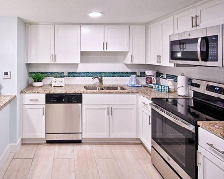 Grand Seas Resort - Daytona Beach, FL, beach resort w/ spacious accommodations, living area, kitchen, & oceanfront views.