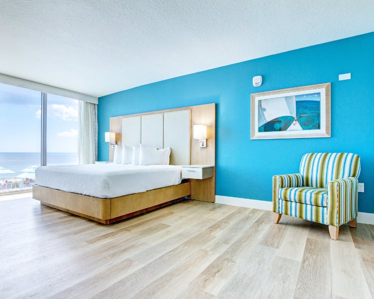 Grand Seas Resort - Daytona Beach, FL, beach resort w/ spacious accommodations, living area, & oceanfront views.