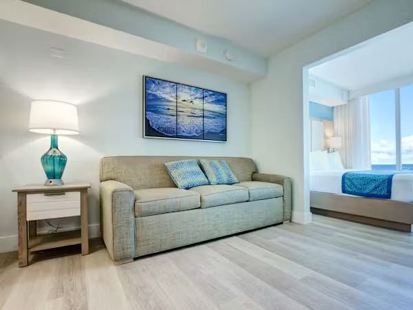 Grand Seas Resort - Daytona Beach, FL, beach resort w/ spacious accommodations, living area, kitchen, & oceanfront views.