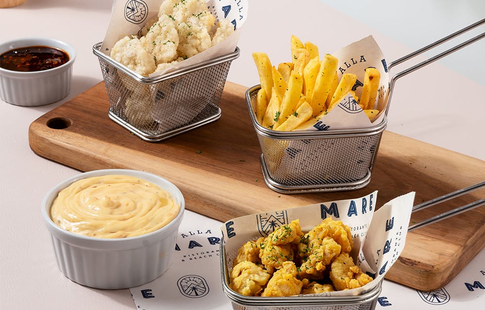 Crispy Cireng, Fries with Truffle Aioli, and Chicken Popcorn (Atas ke Bawah)