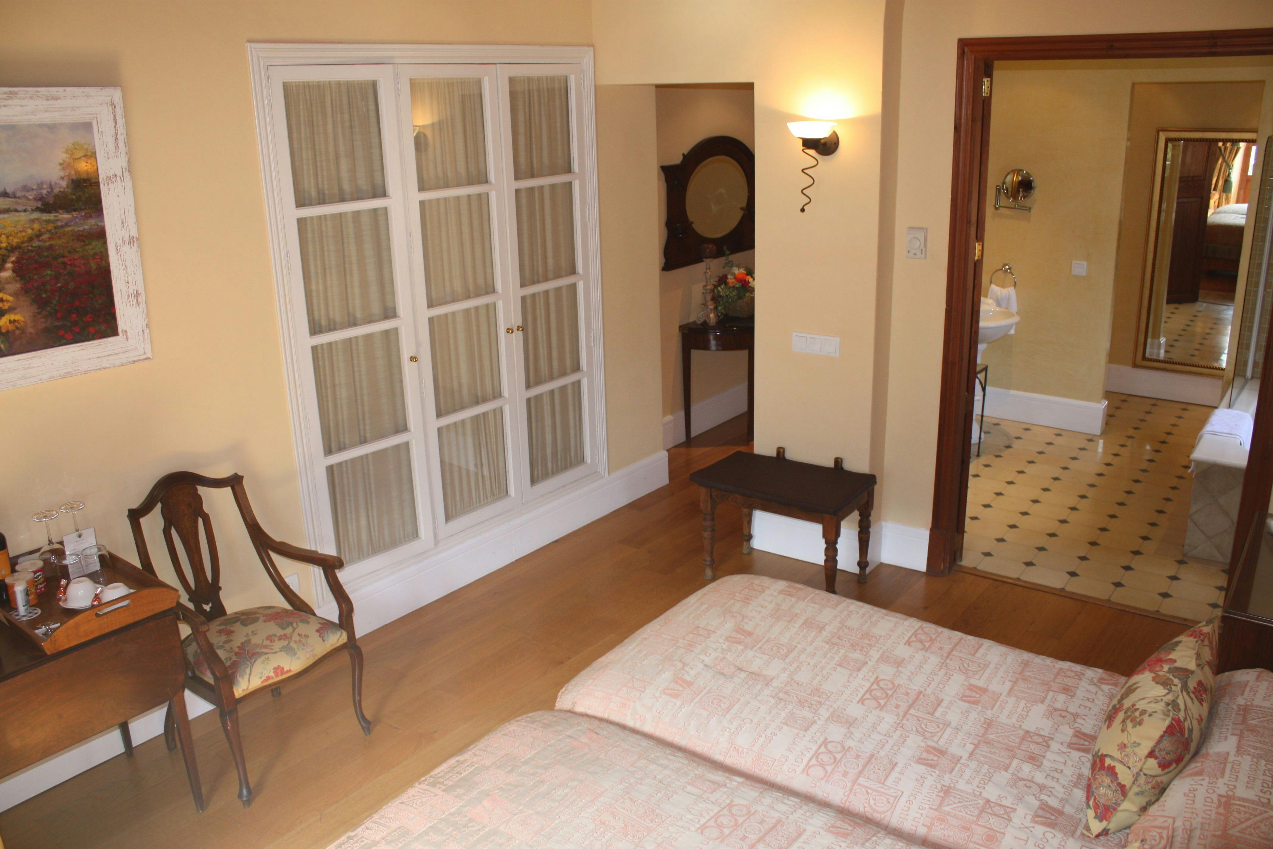 The orange twin room with view of the bathroom