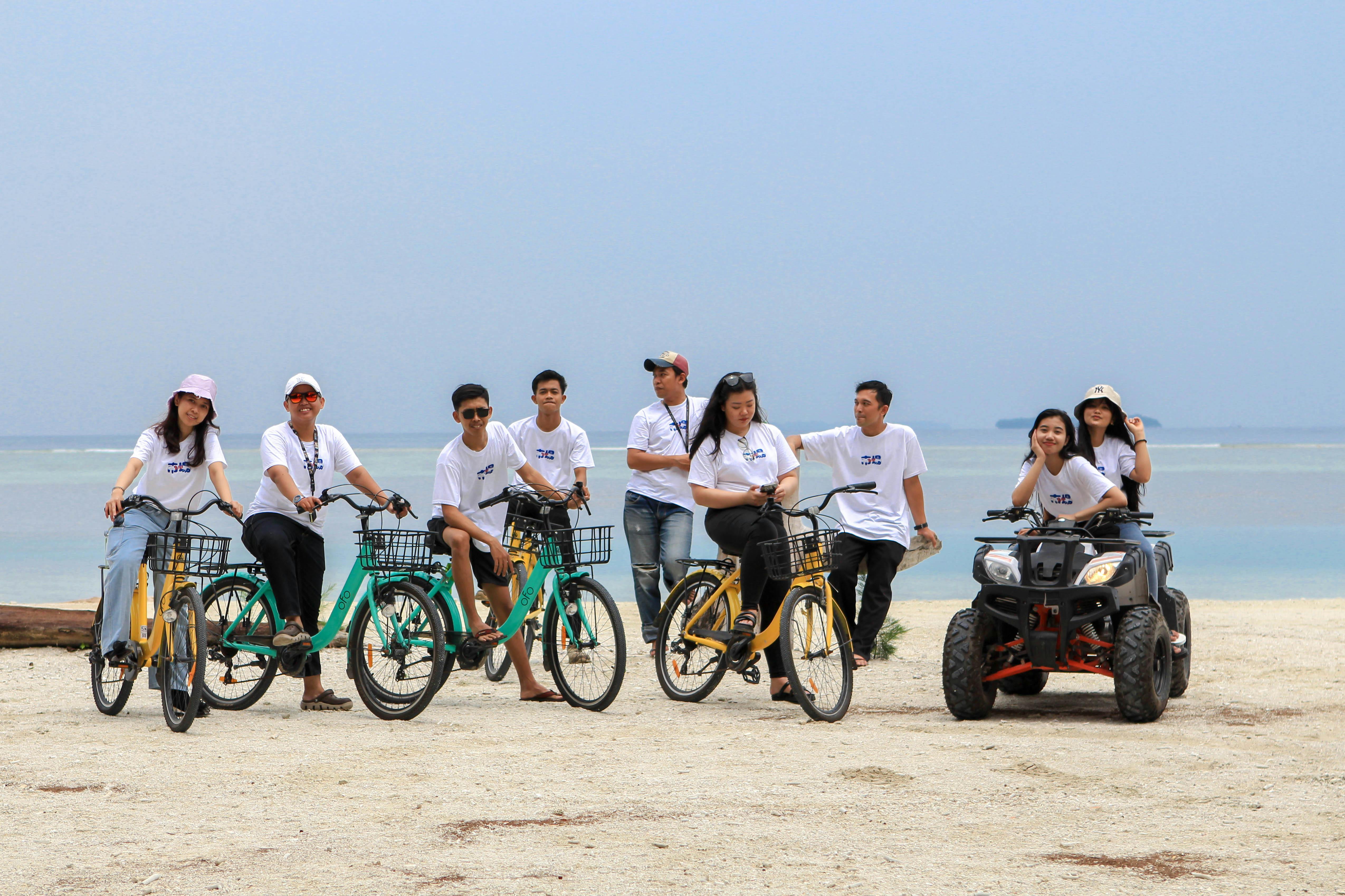Cycling on the beach with Batumera on Pulau Payung in Thousand Islands