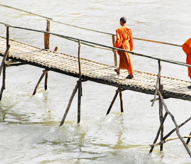 Luang Prabang wooden bridge monks