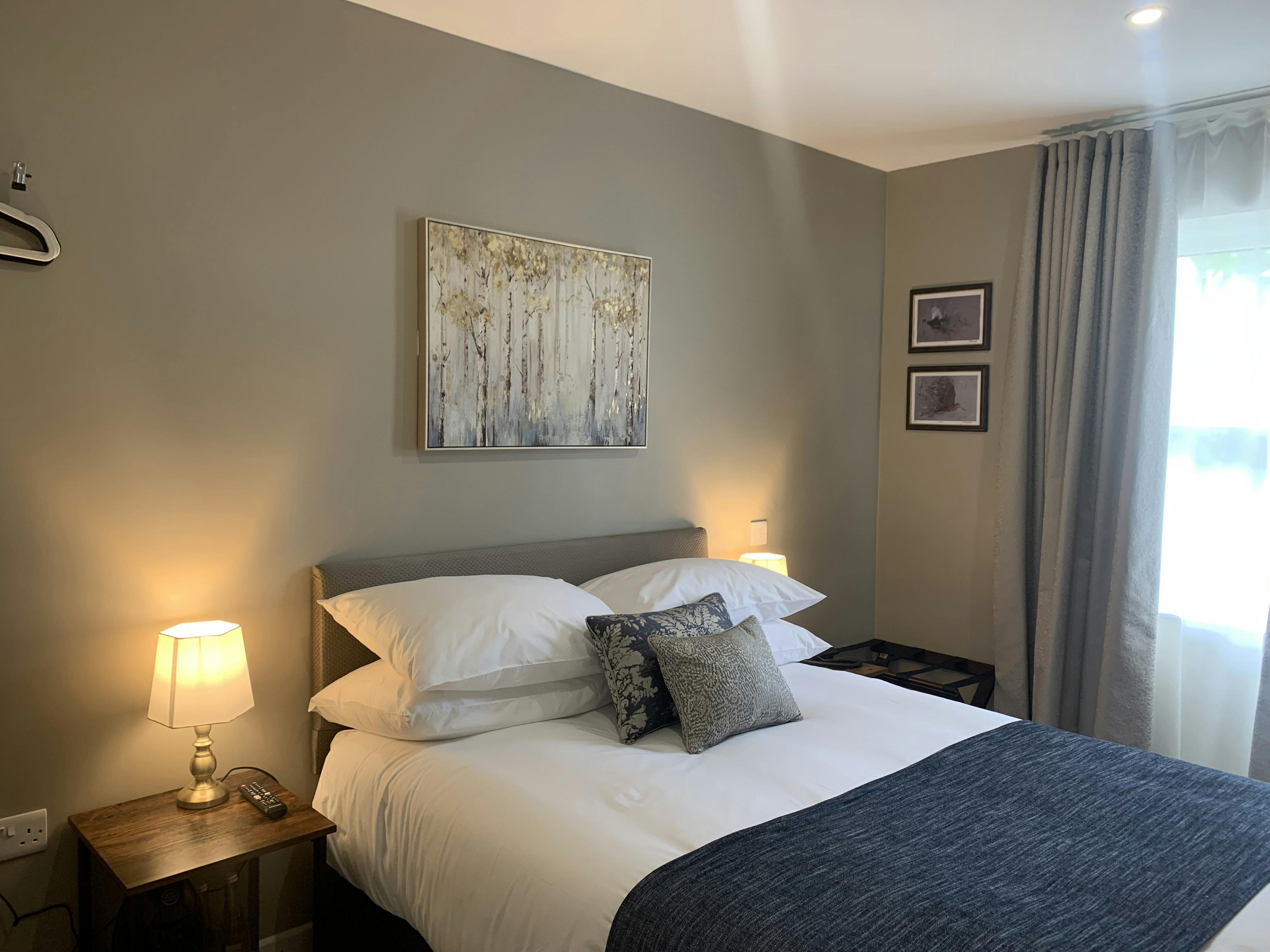 Cosy Double en suite bedroom at The Cedar Country Hotel, Omagh, featuring countryside charm.