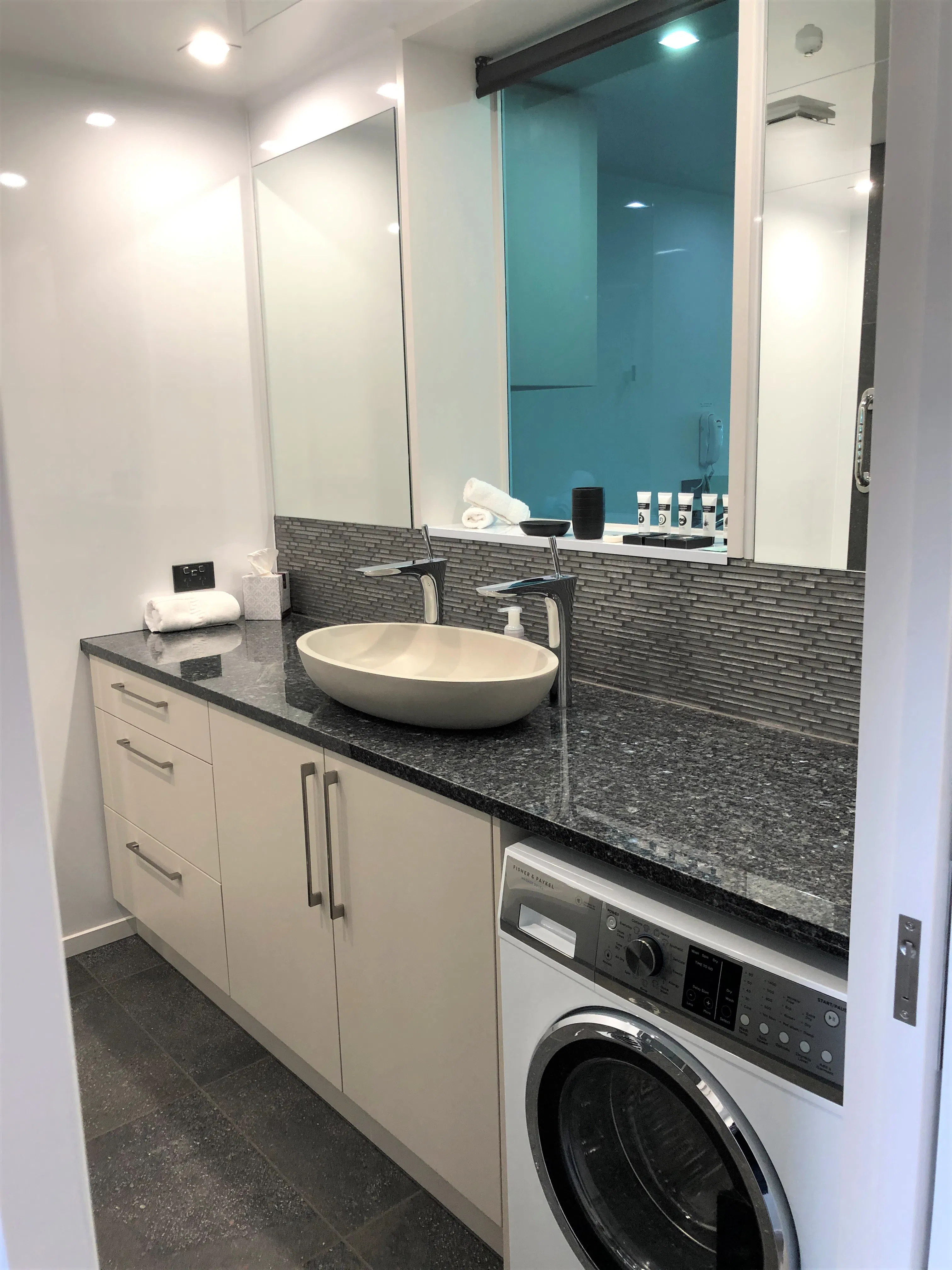 Tanara Bathroom with washing machine