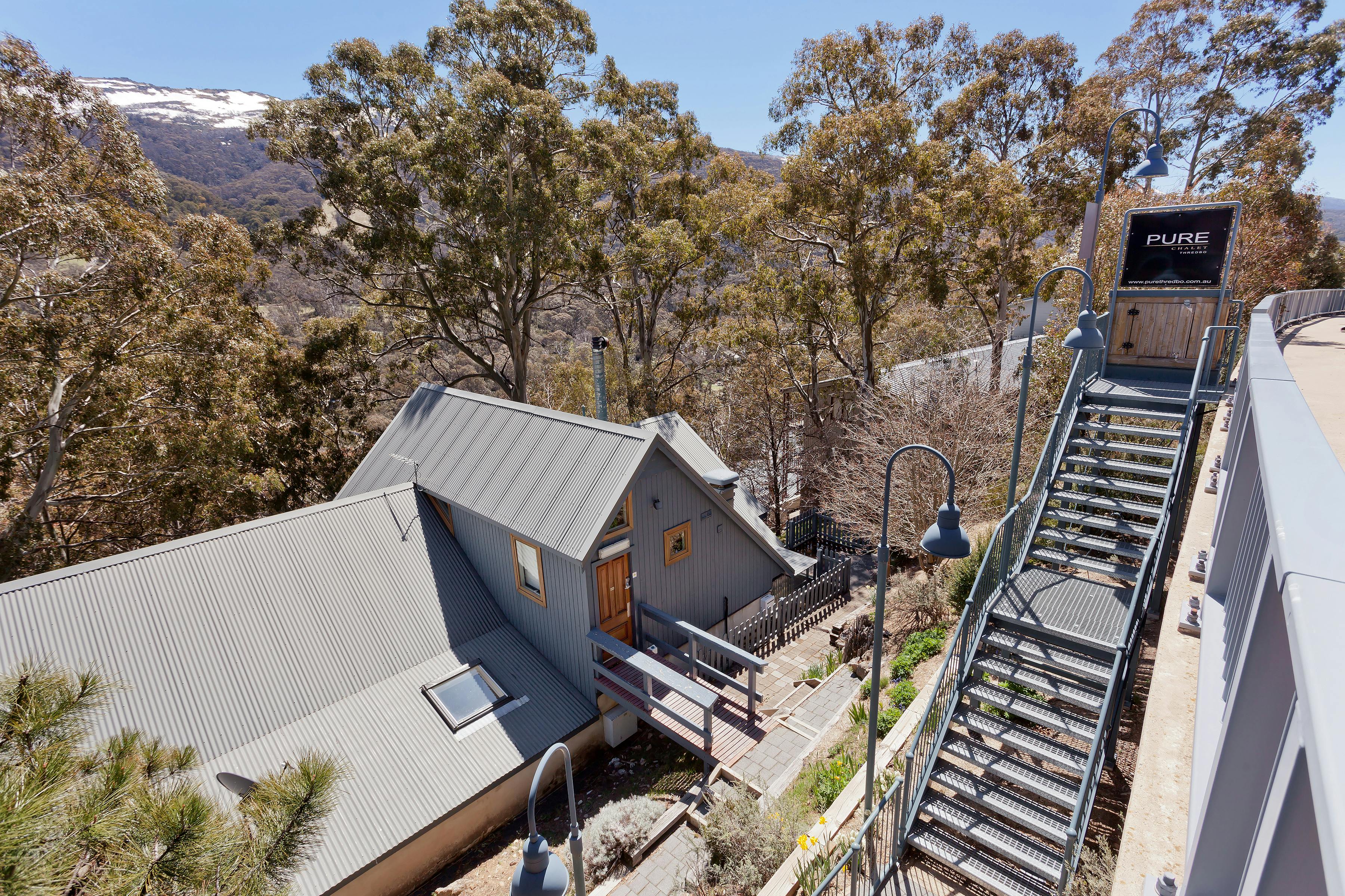 Alpine way entrance and one dedicated car space per room