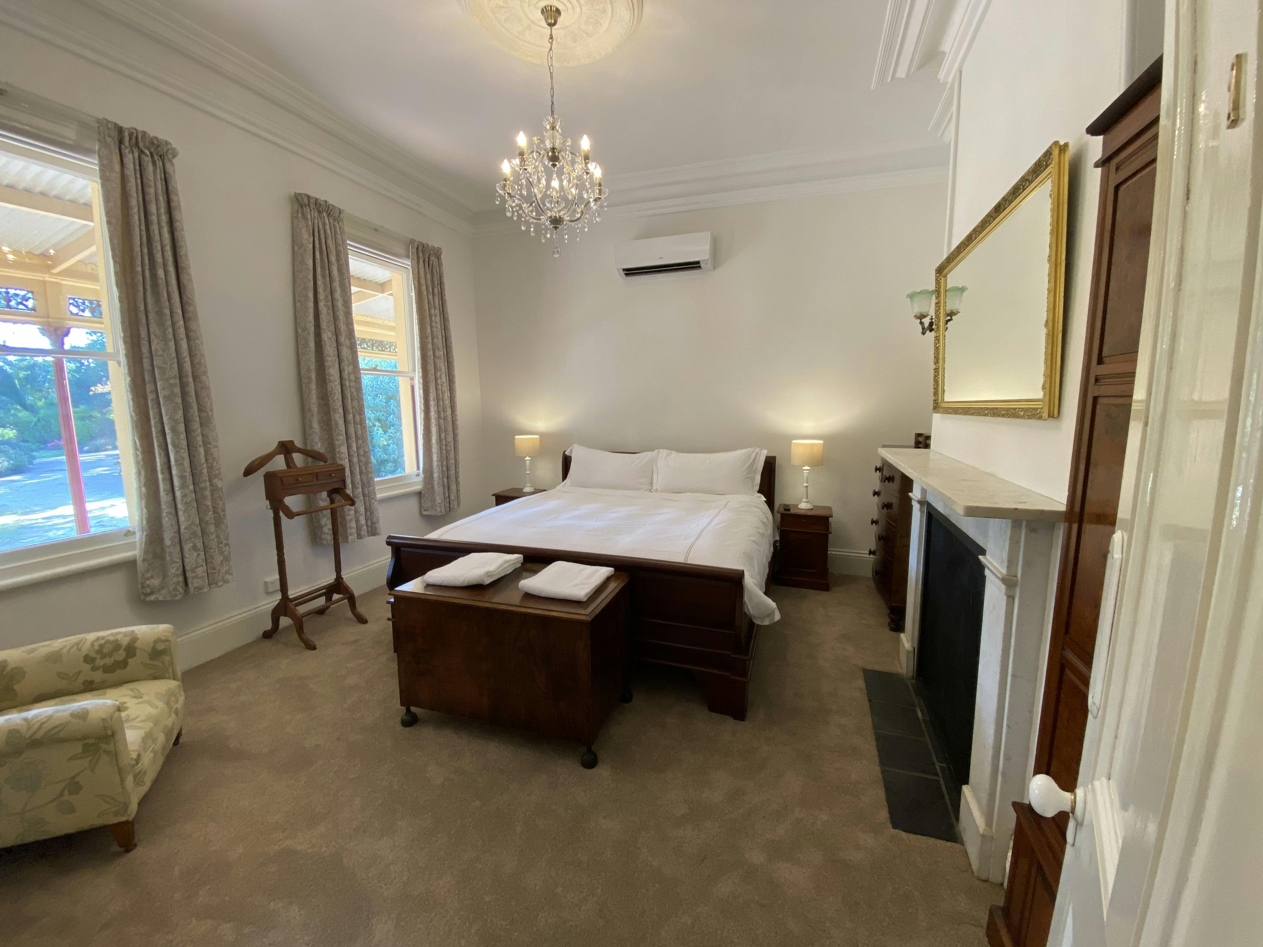 Homestead Room 1 with King bed, electric blanket, garden views.