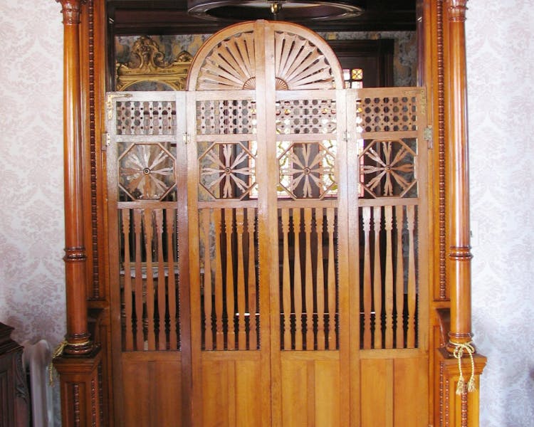 Wood partition in the doorway leading into the Music Room.