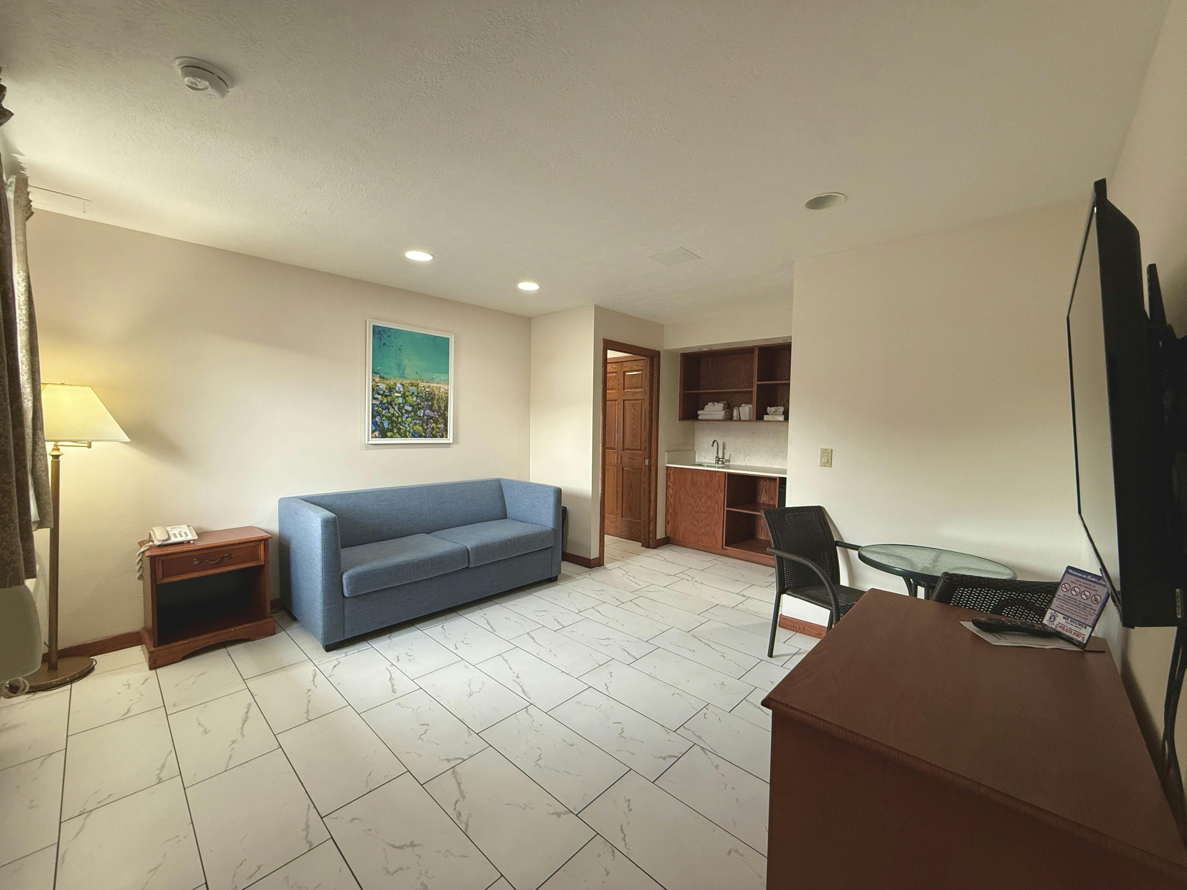 Suite with pull out sofa, kitchenette, dinning table. comfortable spacious room at South Shore Inn in Sandusky