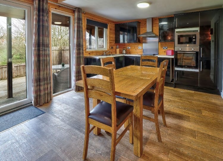 Kitchen and Dining Area, Wensleydale Lodge at Riverside Lodges in Ripon
