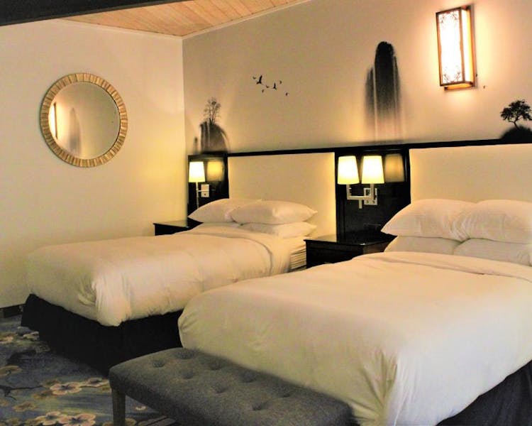 Family room at WangShi Palace with two XL beds and spacious layout, Oklahoma City