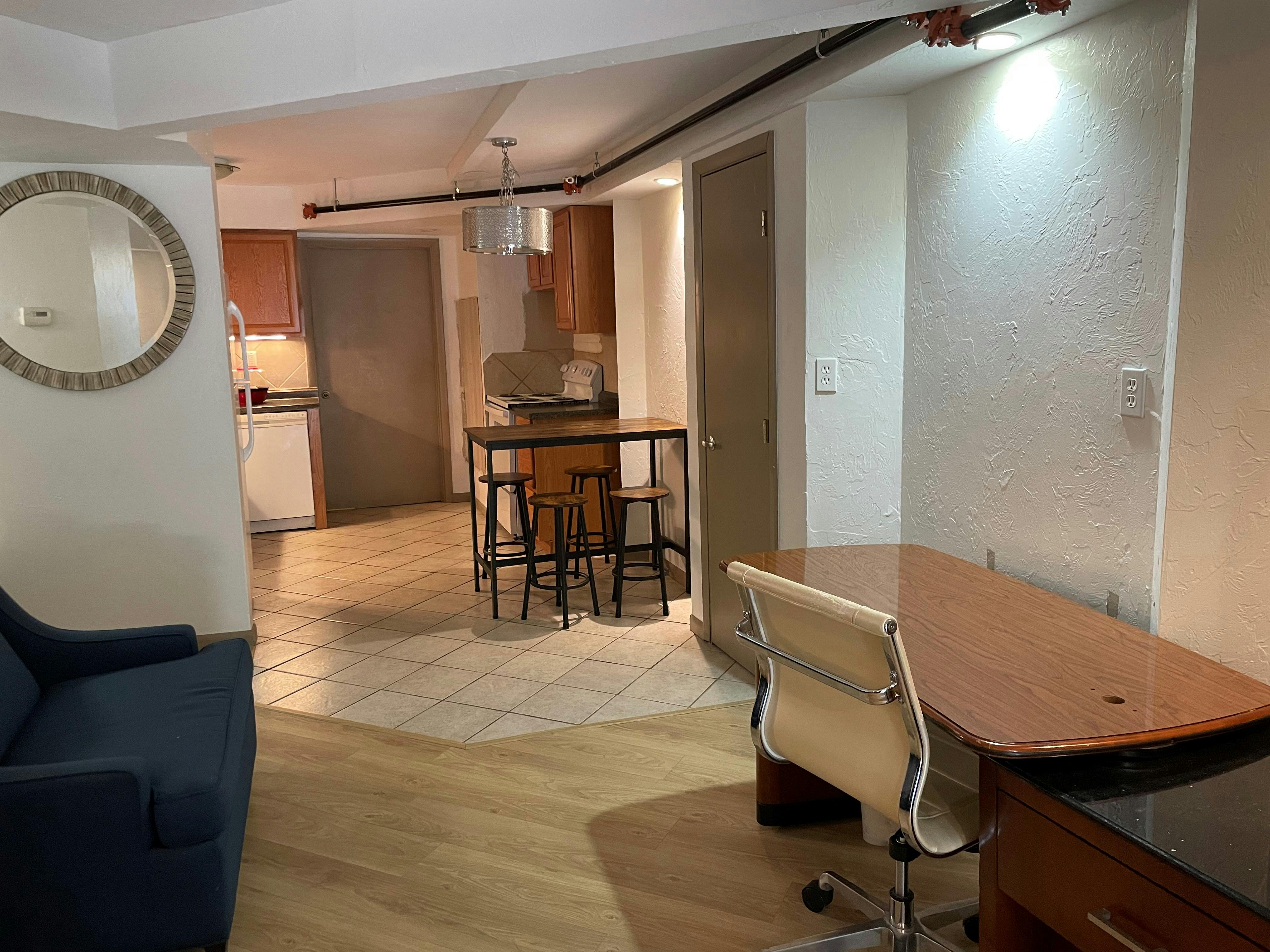 Standard Suite Type 11 living room at WangShi Palace — spacious seating area with TV and balcony access.