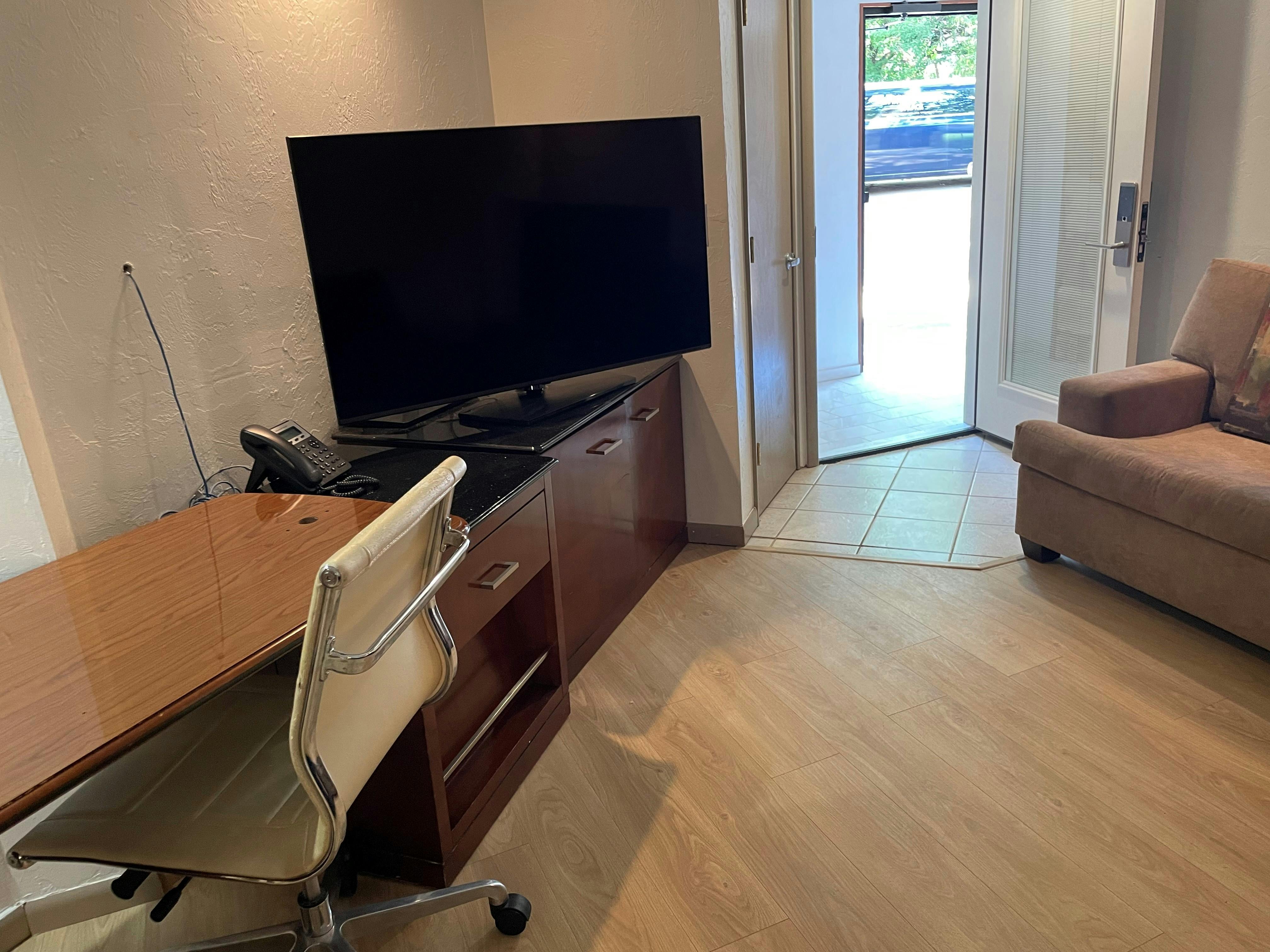 Standard Suite Type 11 living room at WangShi Palace — spacious seating area with TV and