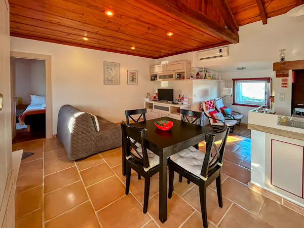 Casa Vermelha - Sala e sofá-cama