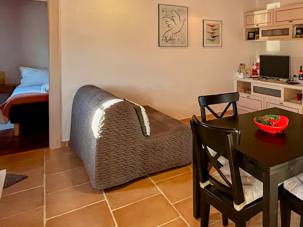 Casa Vermelha - Sala e sofá-cama