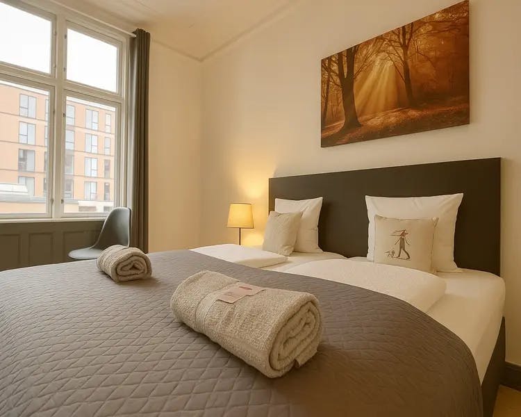 Modern double and familly room with queen bed and city view at Hotel Amager copenhagen