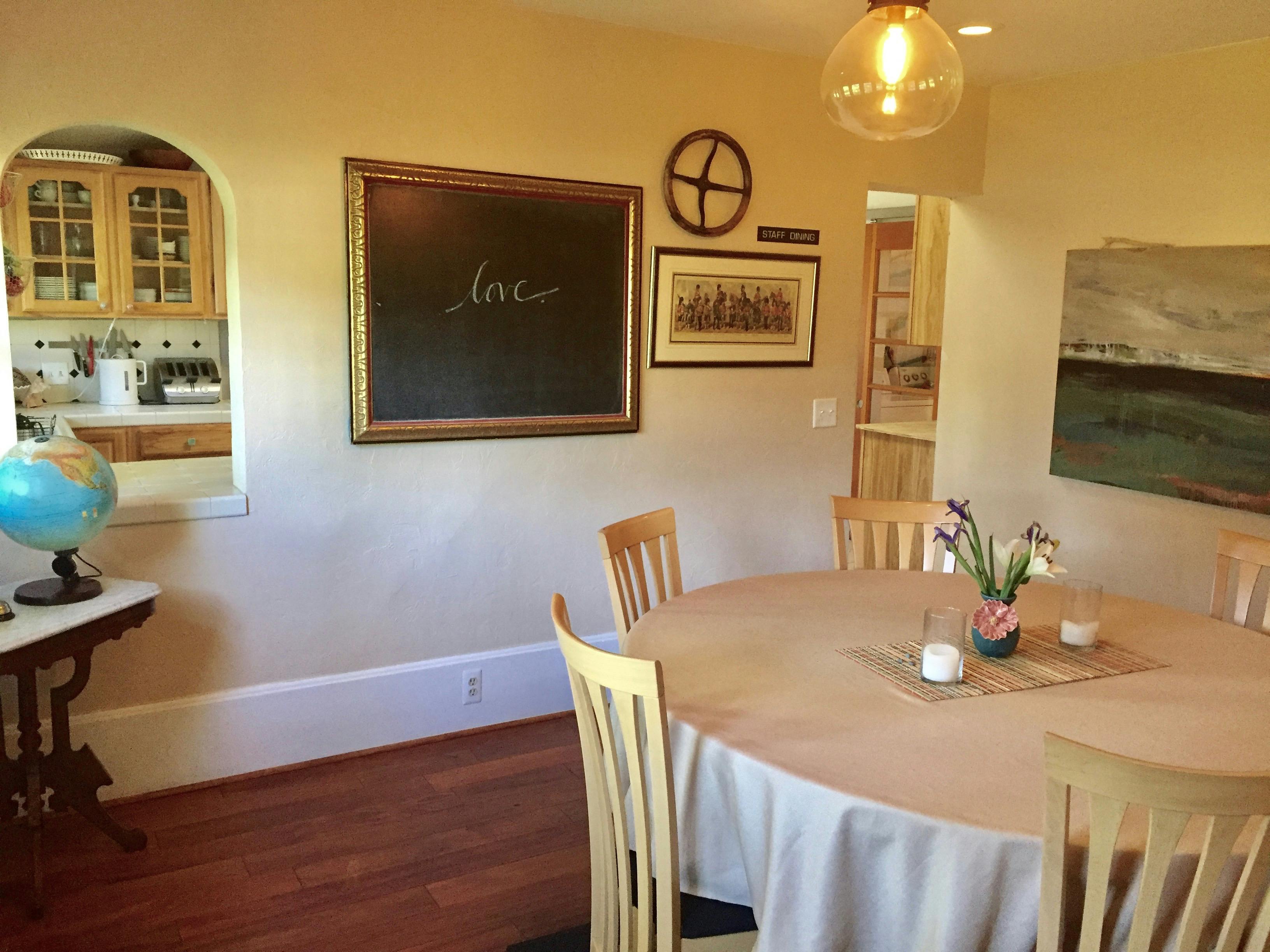 View of breakfast room and kitchen window.