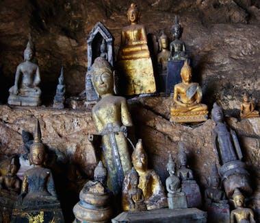 Buddhist statues Pak Ou caves Luang Prabang