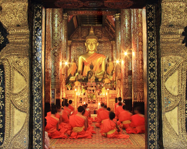 Luang Prabang Laos Wat Xiengthong Buddhist monks chanting