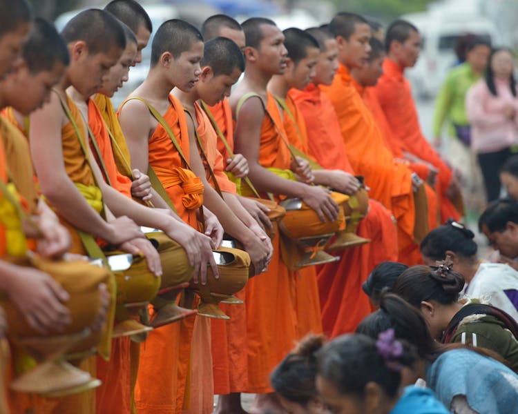 Luang Prabang buddhist monks collecting alms