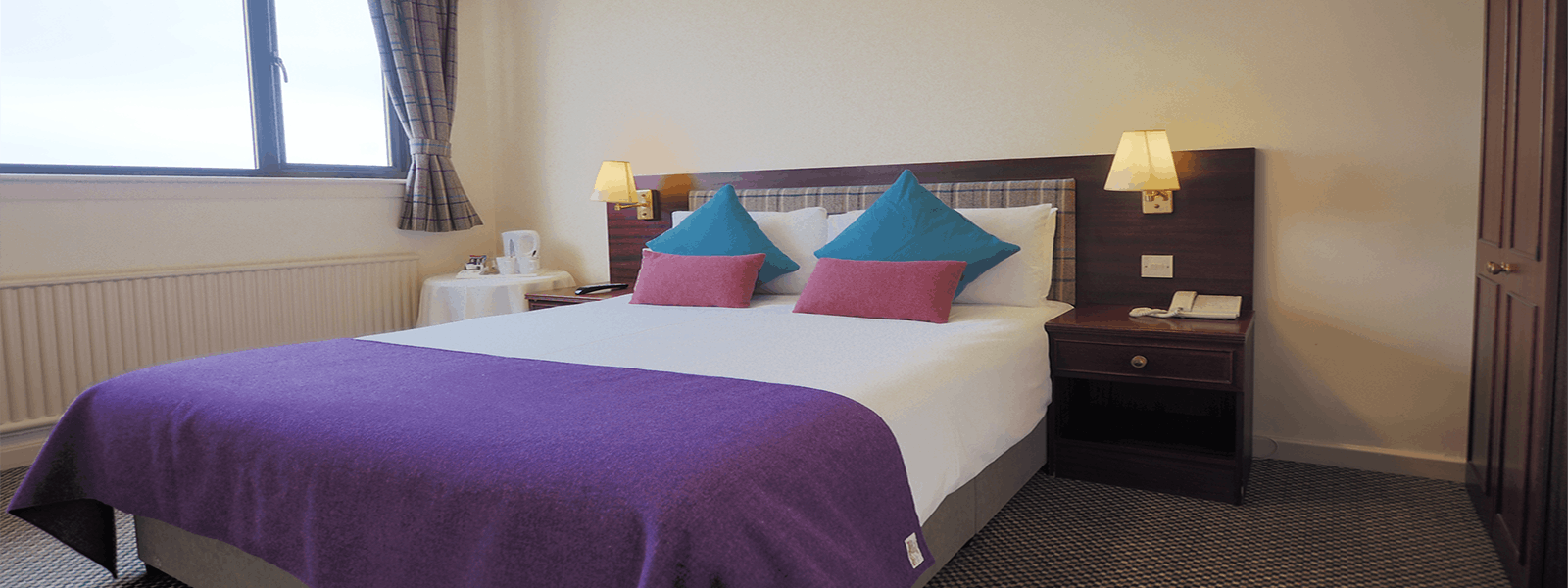 Double bed in the Caladh Inn hotel, Stornoway, Isle of Lewis