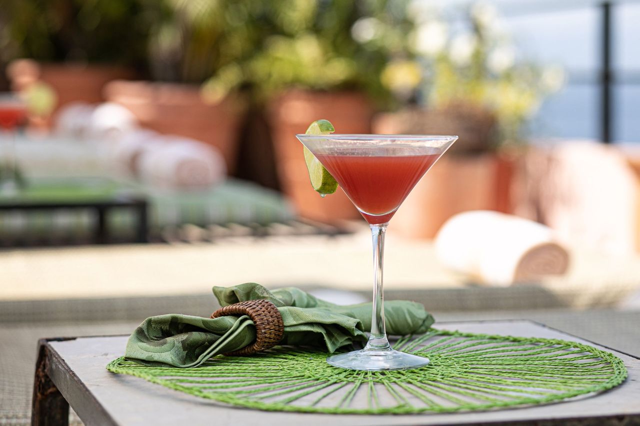Pink cocktail with lime at La Ola Restaurant