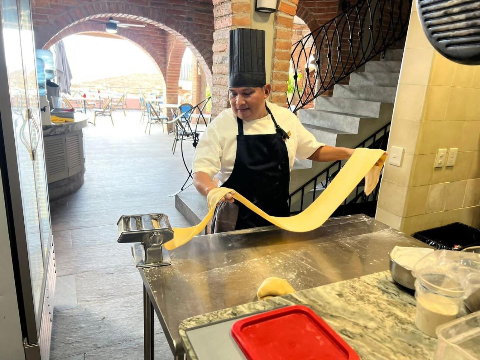 Chef making fresh pasta at La Ola, Quinta Maria Cortez in Puerto Vallarta