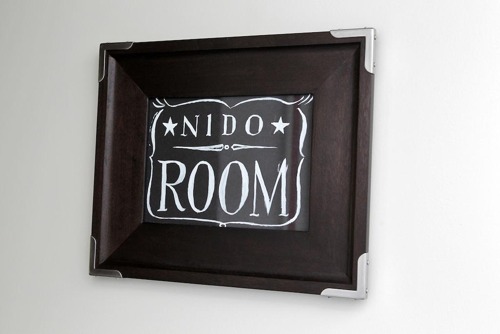 Junior Suite Nido Room, logo