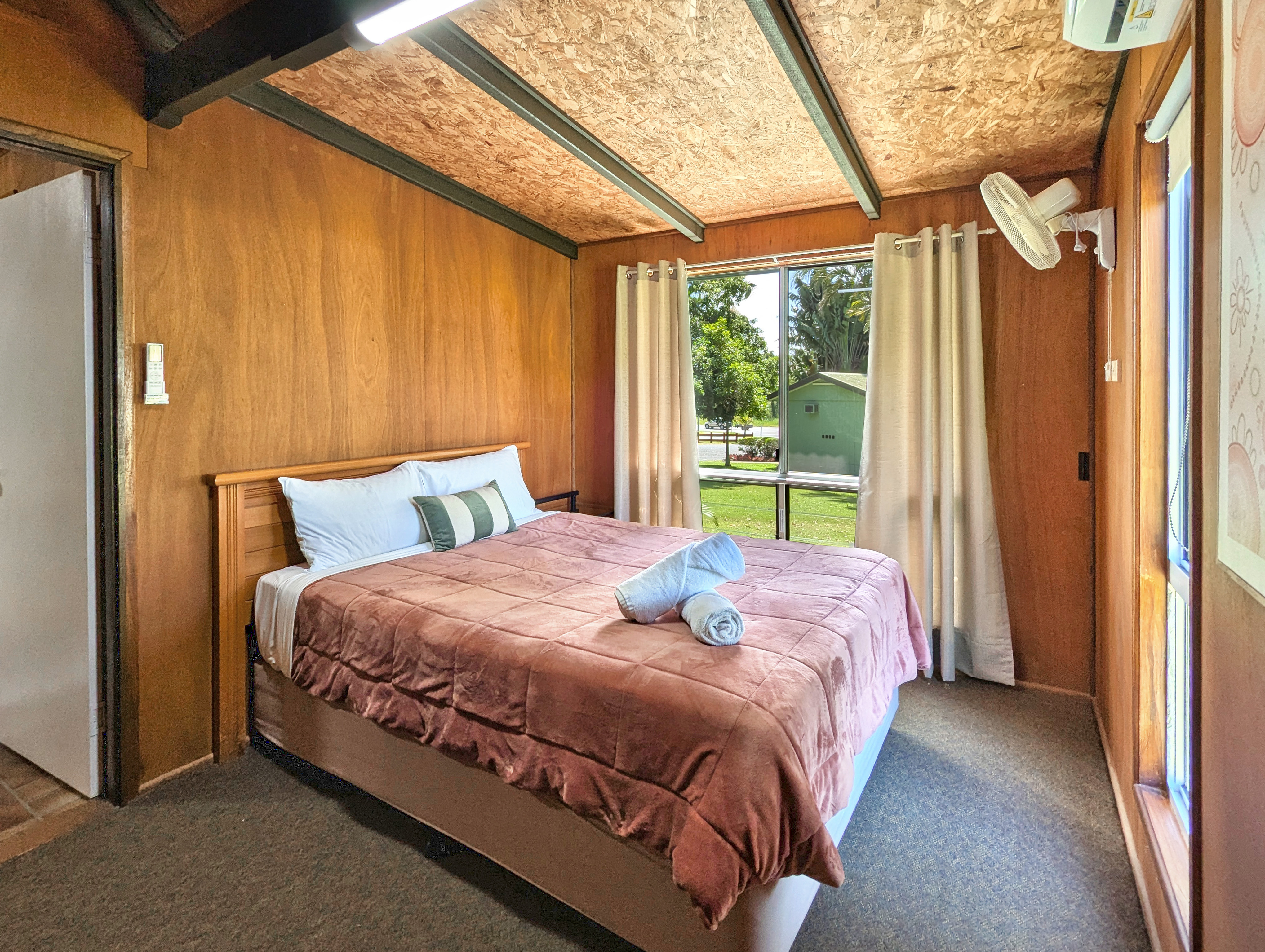 queen bed in cabin 12