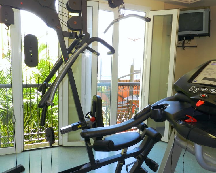 Hotel Casa do Amarelindo fitness com bicicleta e estação