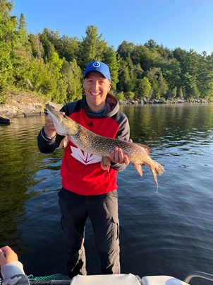 New Owner's Proud Catch at Dayspring Cottages - Holding His First Big Pike