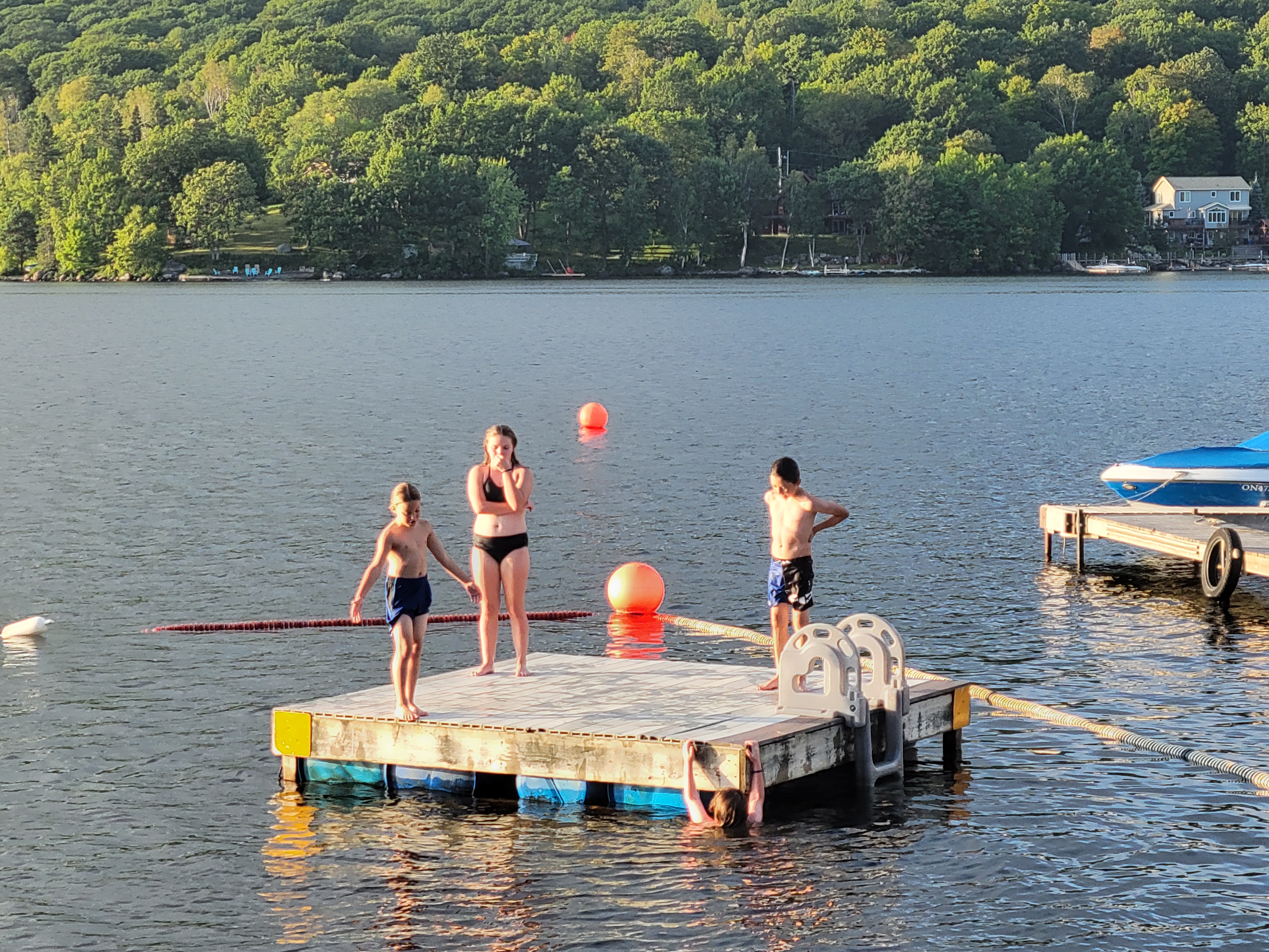 Kid-Friendly Water Platform Fun at Dayspring Cottages - Children Enjoying Water Play"