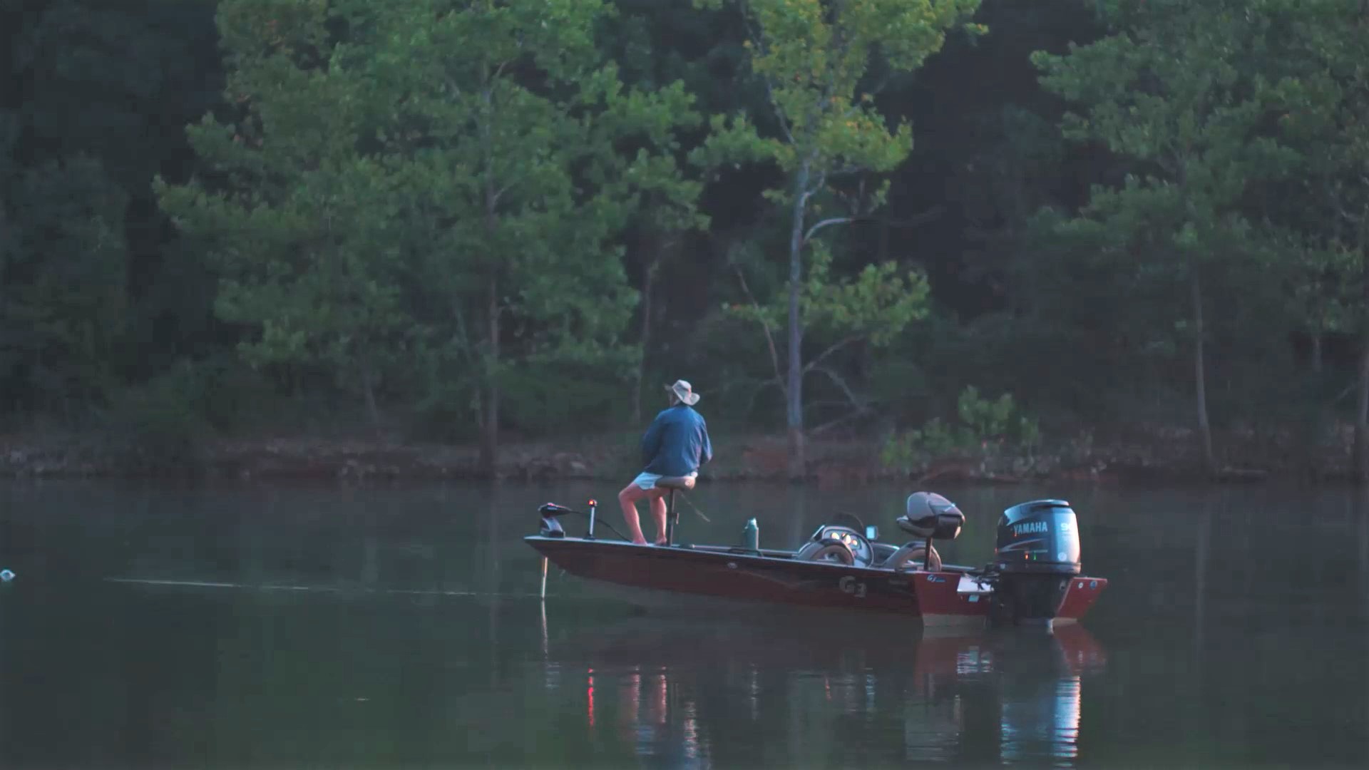 fishing boat on lake